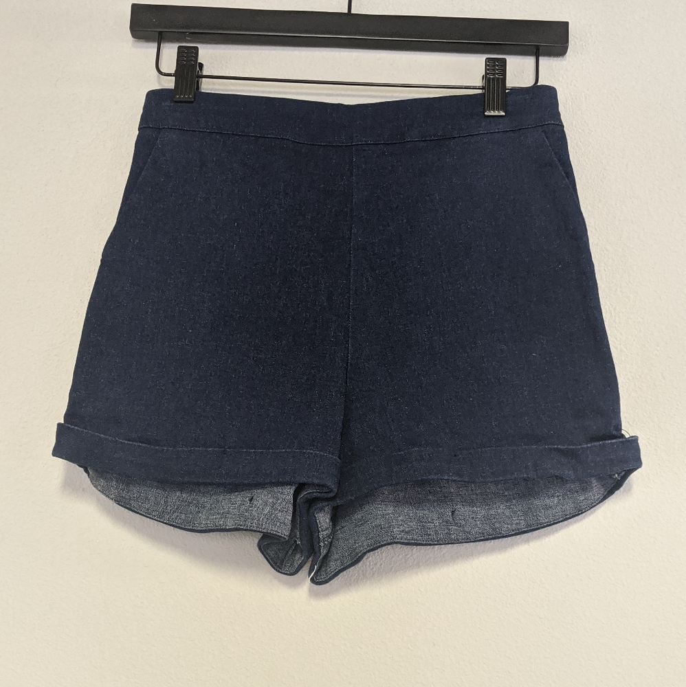 Reformation stretch jean shorts with rolled hem